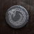 Symbol Jormungandr na okrągłym kamieniu łupkowym.png